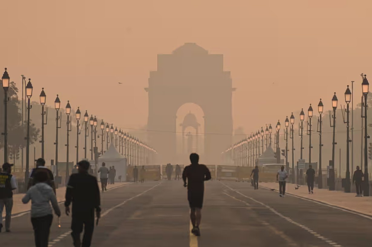 people on a bridge in heavily polluted air